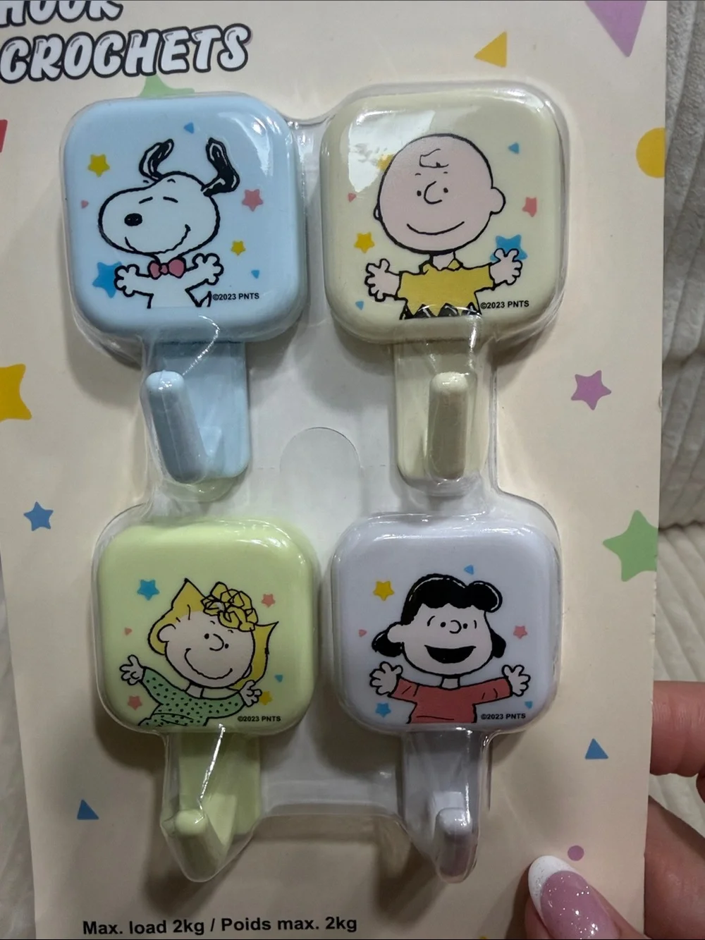 Peanuts Kids Adhesive Hooks - Set of 4 (Blue, Cream, Light Green, White). New
